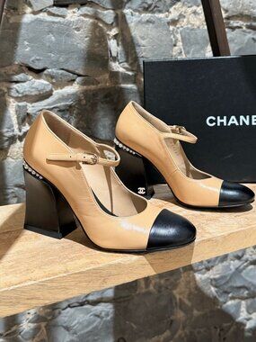 Chanel 2022 Beige Black Pearl CC Accent Heeled Mary Jane Pumps.